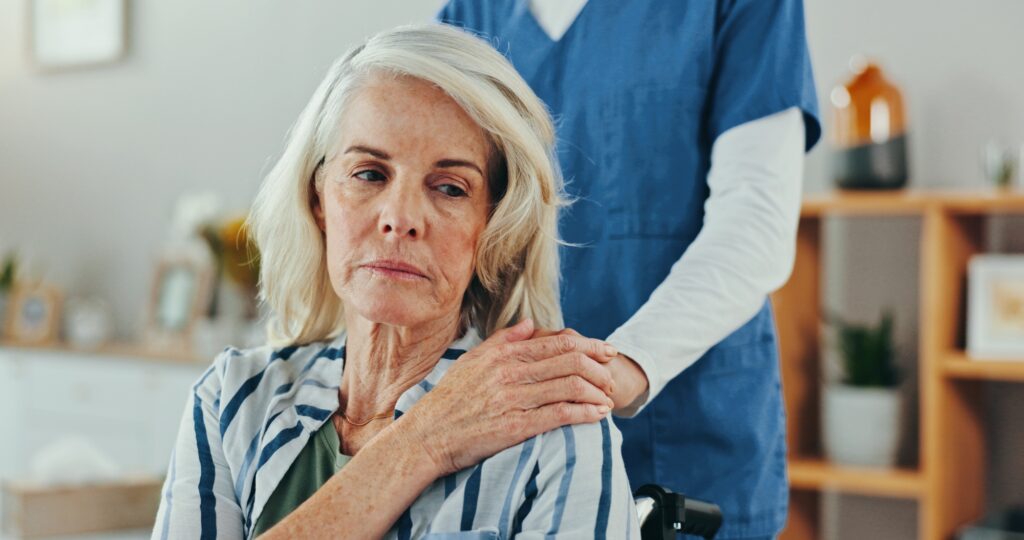 Sad, senior woman and hands of nurse with empathy, compassion and comfort for grief, loss or suppor