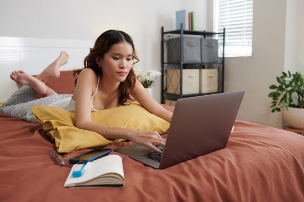 College Student Working on Laptop