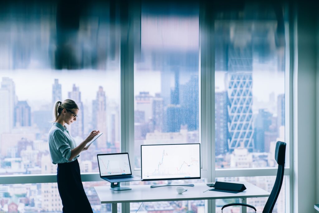 Businesswoman with tablet working in office