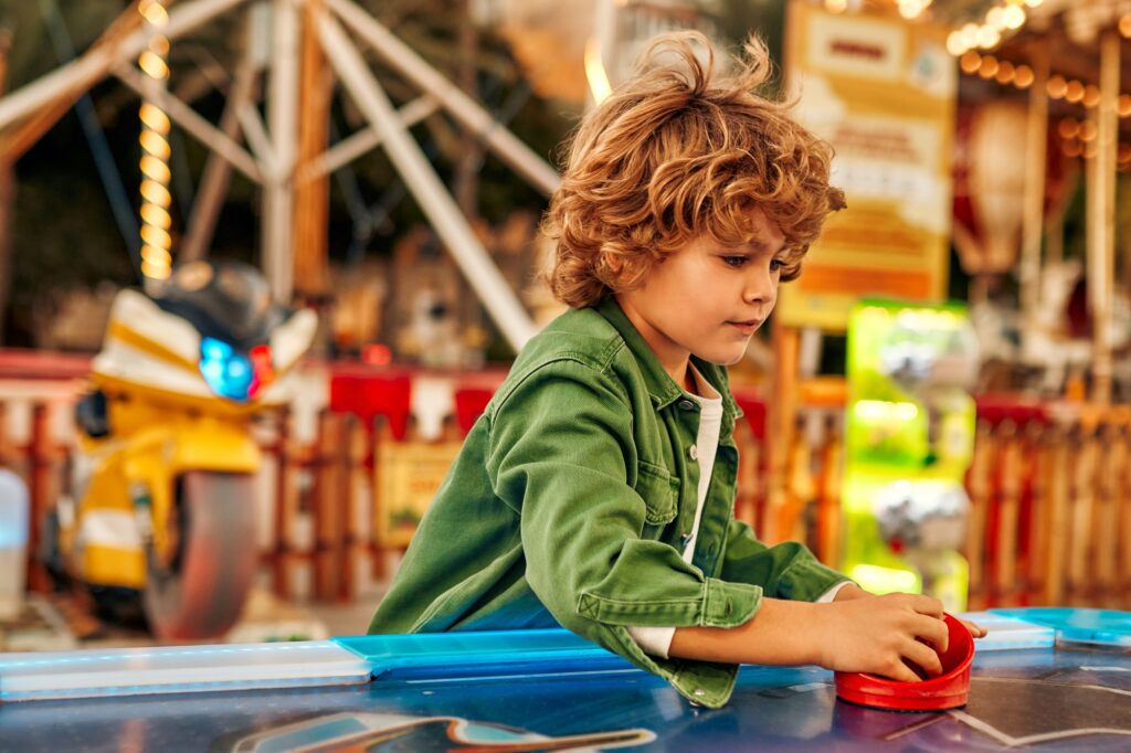 Kids having fun on a carnival Carousel