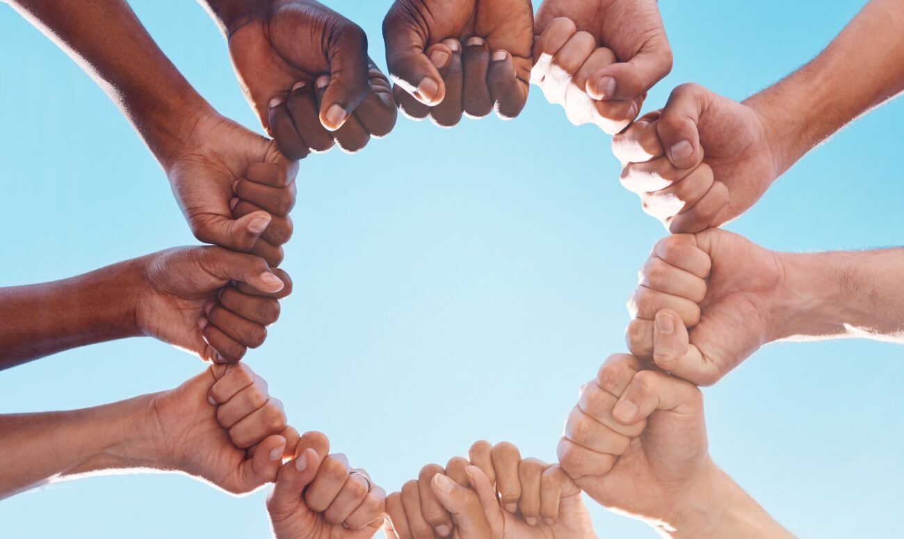 Fist hands, circle and diversity support human rights people, protest group and freedom of racism o