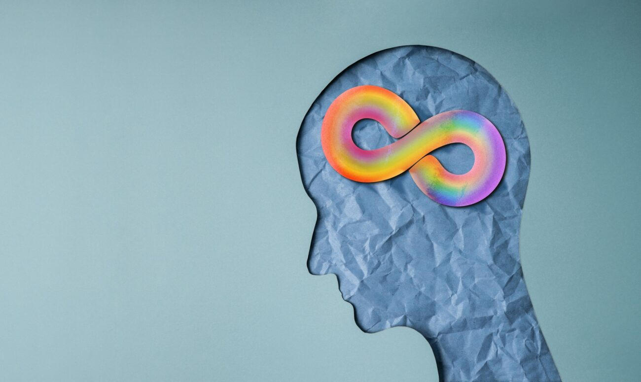 World Autism Day Concepts. a Rainbow Infinity Symbol on the Brain. Autism Awareness Day